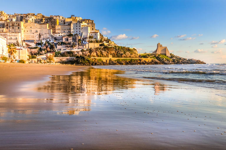 Clinging to the hillside, the whitewashed village of Sperlonga offers spectacular views over the Tyrrhenian Sea — © Roberto Armocida / Getty Images Plus
