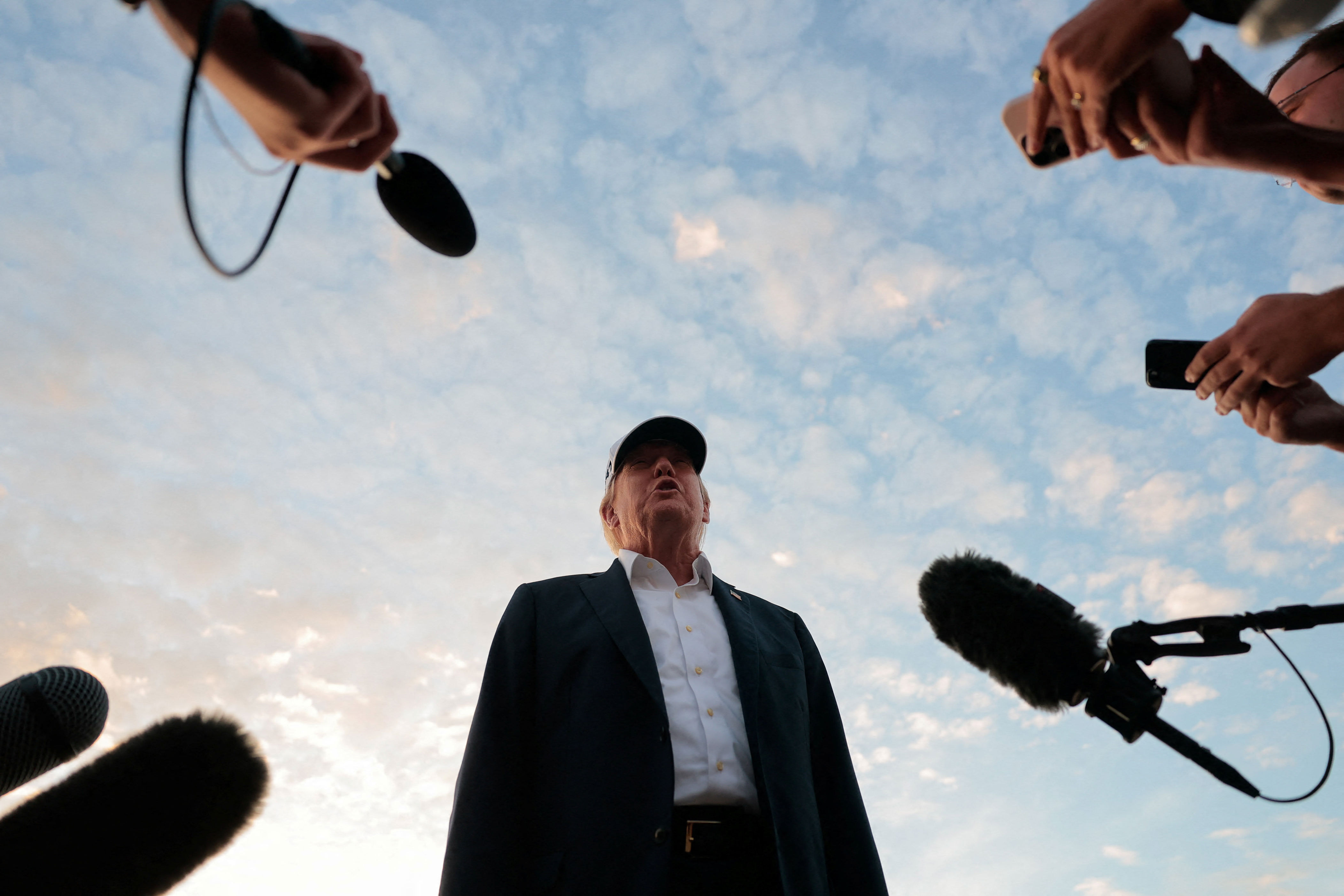 Trump's White House press pool ban lifted by federal judge, reporters ...