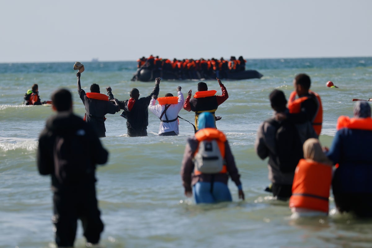 Far-right UK activist arrested after migrant dinghy slashed in the ...