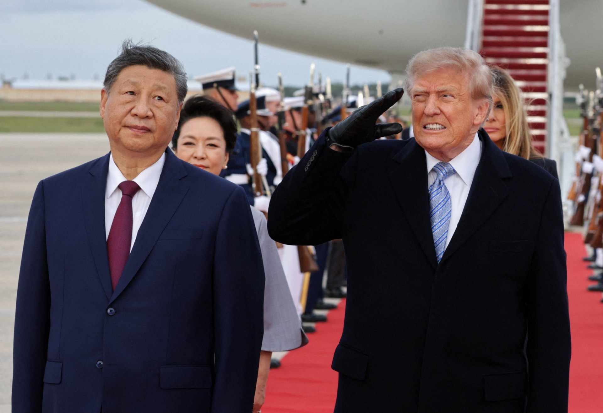 Trump winces after fighter jets roar above him during military flyover