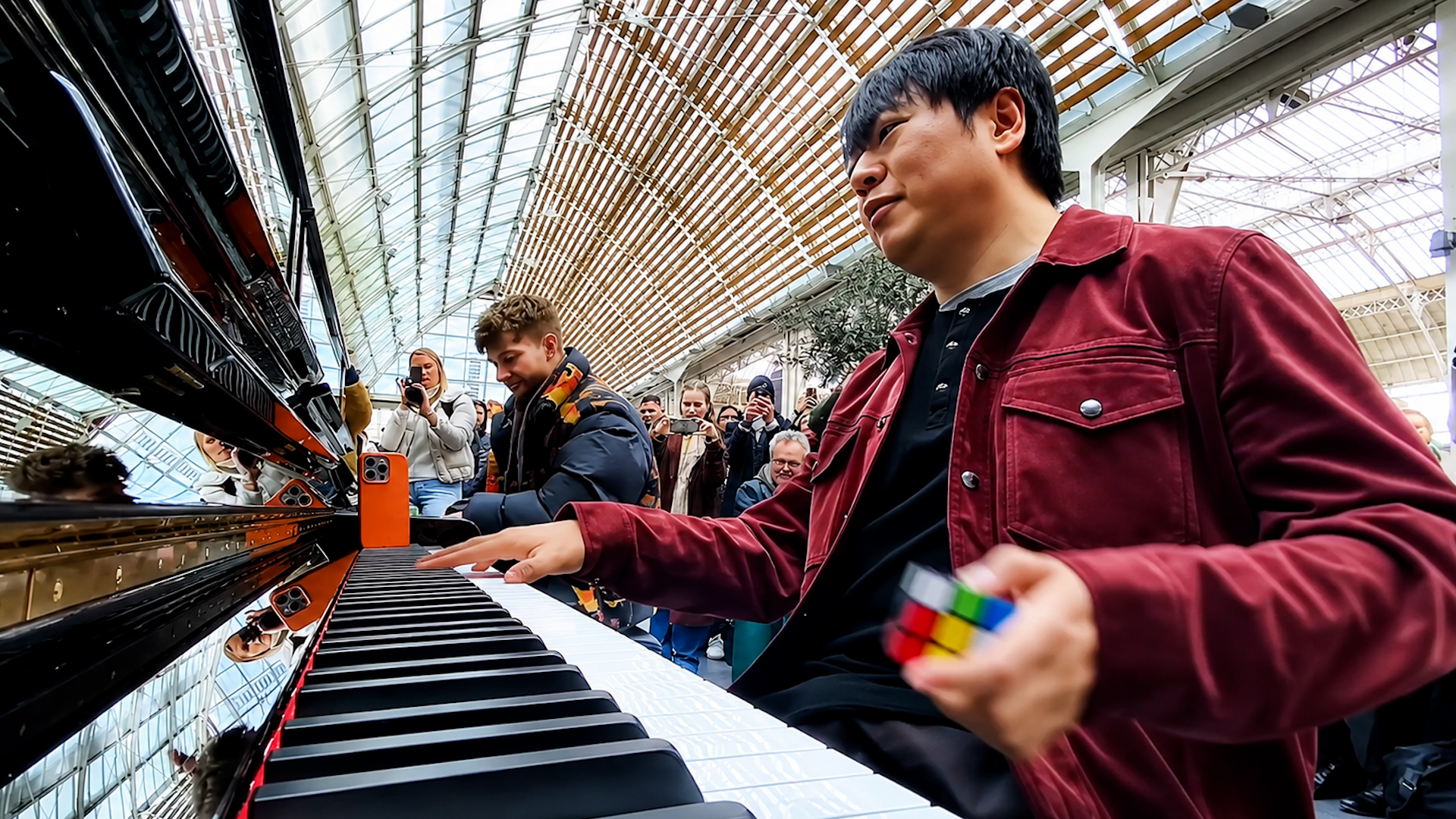 This train station piano performance turns into a battle