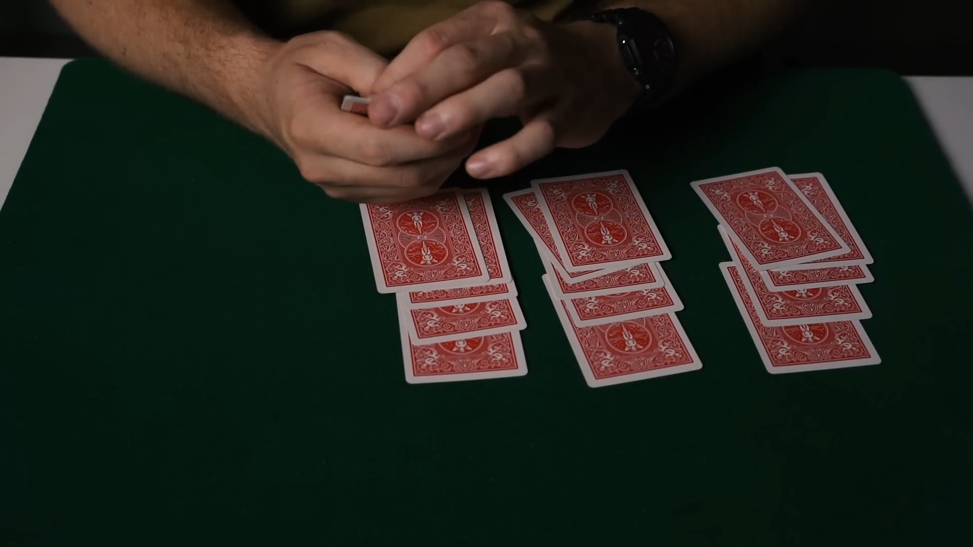 The poker game looked fair then the magician dealt himself the perfect win