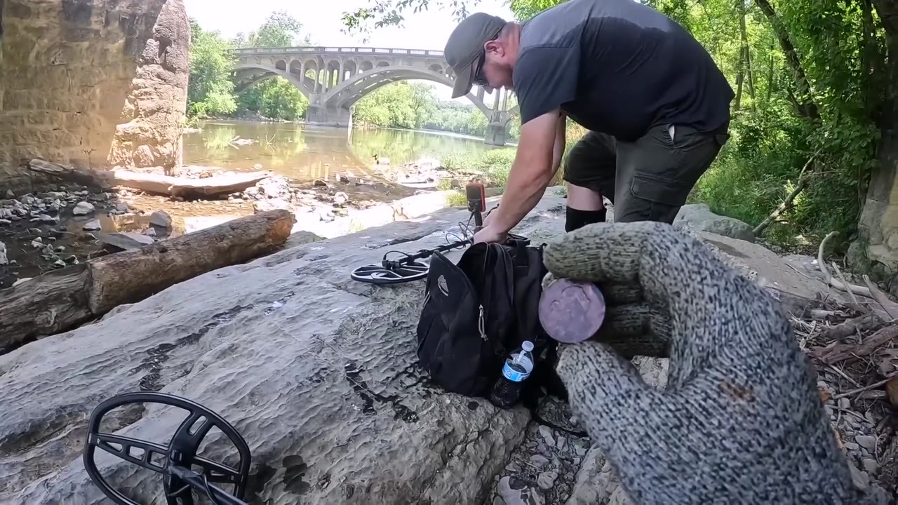 He was searching beneath an old stone bridge. Then an 1807 large cent ...