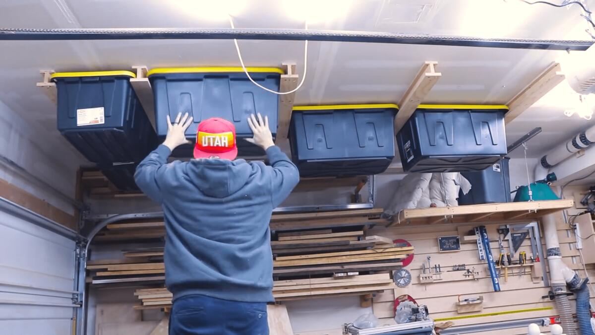 Man creates clever storage solution in garage to store boxes