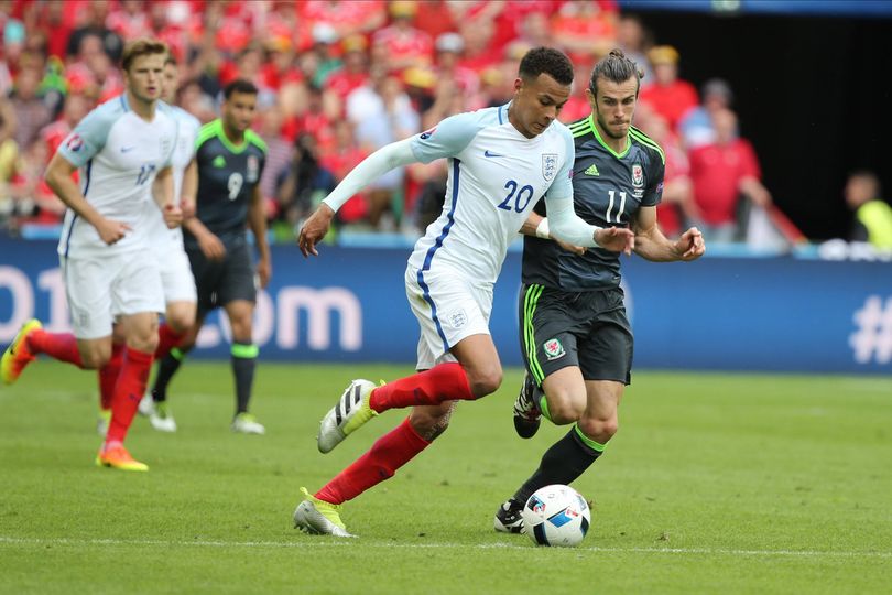 LENS, FRANCE - June 16: Dele Alli of England and Gareth Bale of Wales challenge during the UEFA Euro 2016 Group B match between England and Wales at Stade Felix Bollaert-delelis on June 16, 2016 in Lens, France. (Photo by Richard Sellers/Sportsphoto/Allstar via Getty Images)