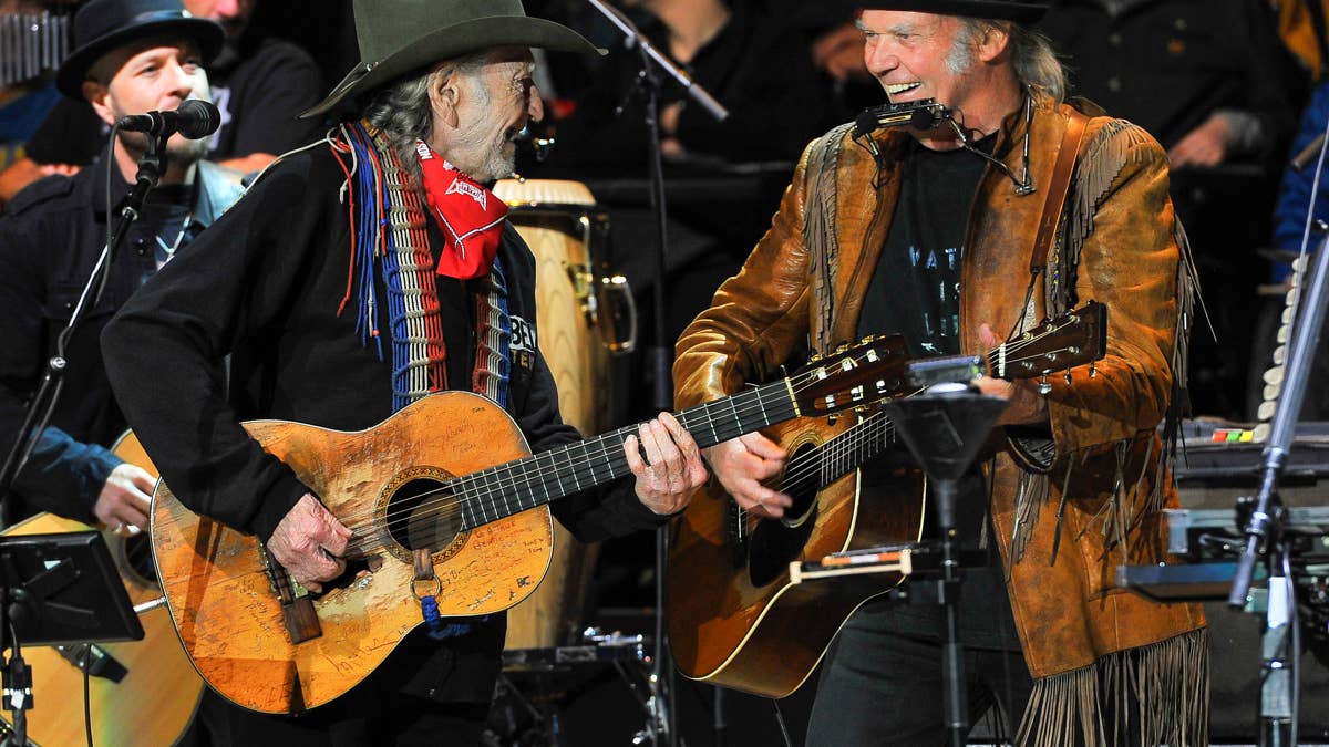 Neil Young returns to stage with Willie Nelson after canceling European ...