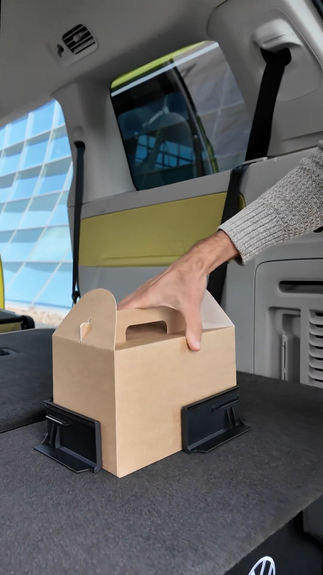 Cargo divider helps organize items in the VW ID. Buzz LWB