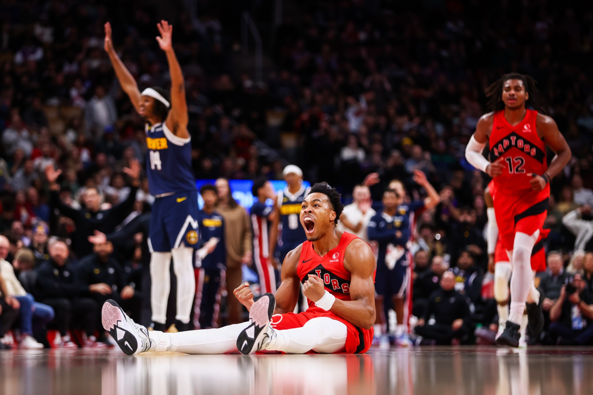 Raptors star goes viral for antics behind reporter's live hit