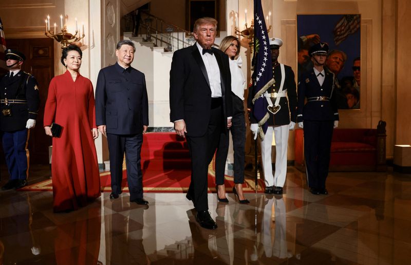 US President Donald Trump and first lady Melania Trump walk with Chinese President Xi Jinping and his wife, Peng Liyuan, at the White House ahead of a state dinner in Washington, D.C., US, September 24, 2026. REUTERS/Evelyn Hockstein