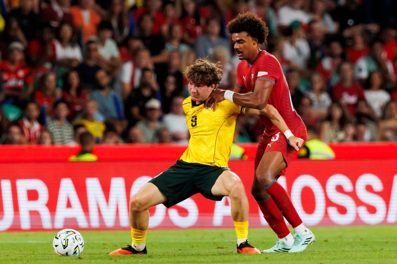 Lewis Koumas of Wales (L) is challenged by Renato Veiga of Portugal (R) during the UEFA Nations League 2026/27 Group A4 League Phase match between Portugal and Wales