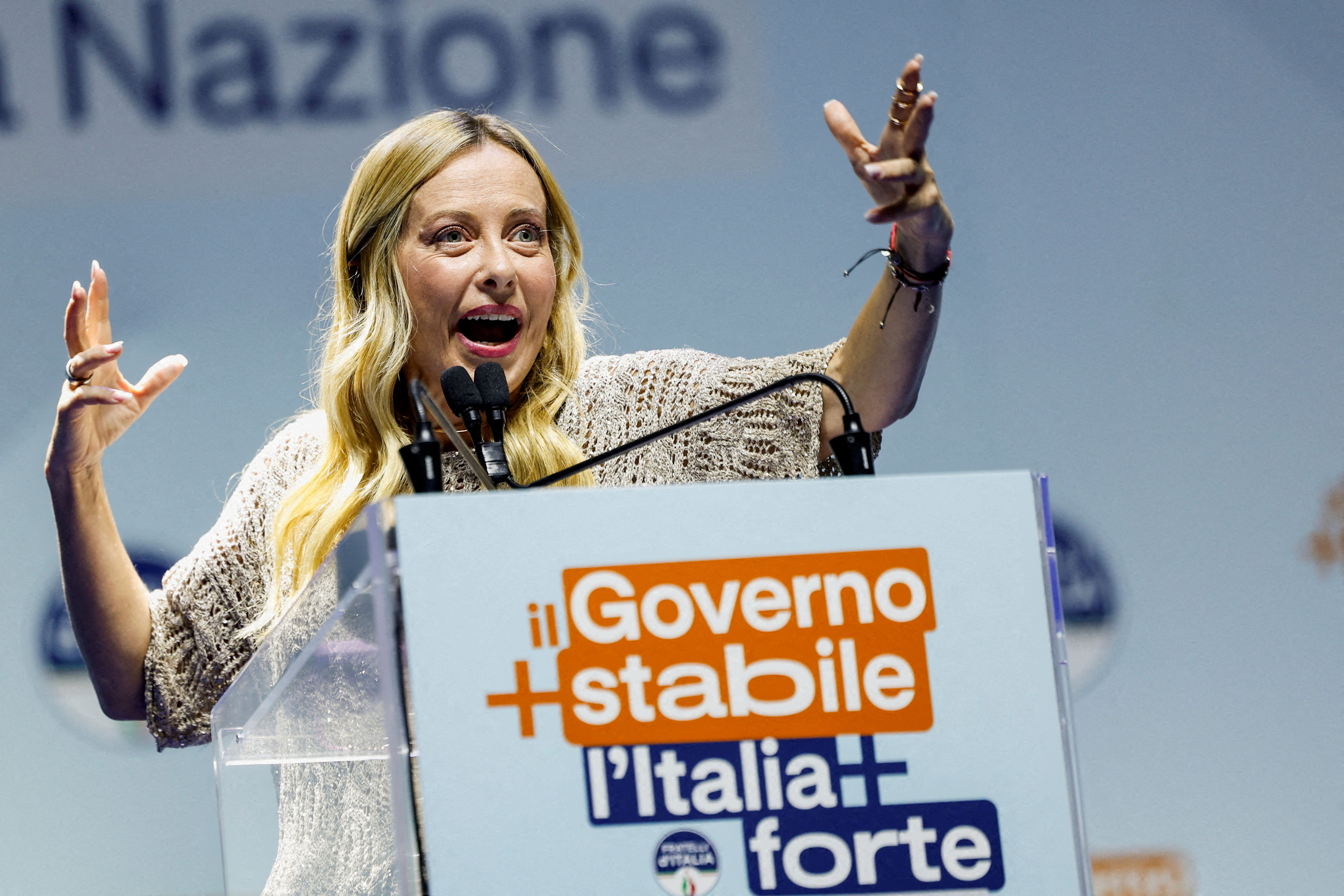 Italian Prime Minister Giorgia Meloni speaking at a government meeting.