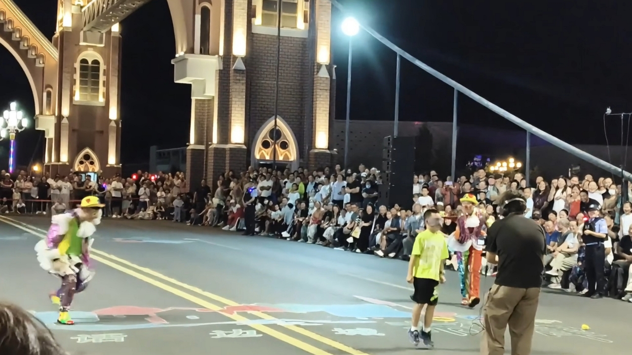 Blindfolded boy keeps jumping after rope stops at night show in Xinjiang