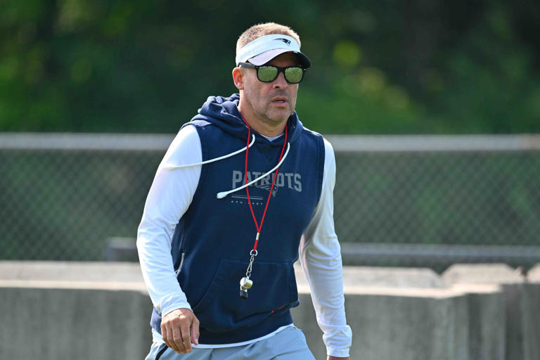Josh McDaniels' true thoughts on OL competition behind Mike Onwenu