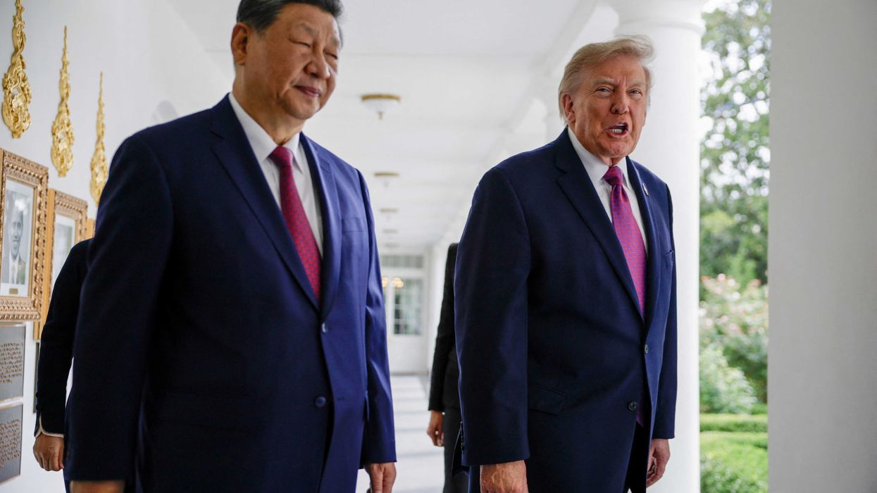 Outrage as Trump flaunts 'autopen' portrait in front of world leader