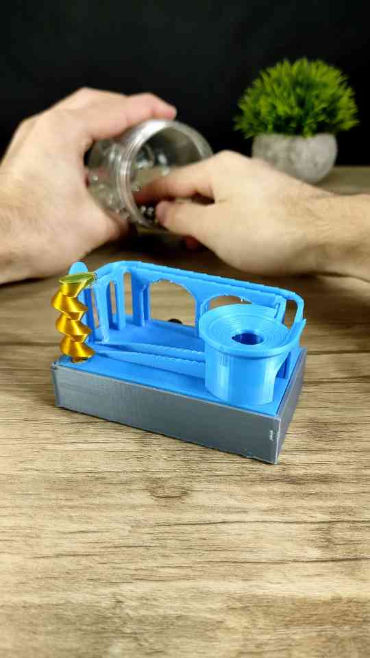Motorized 3D printed marble run machine with mesmerizing design