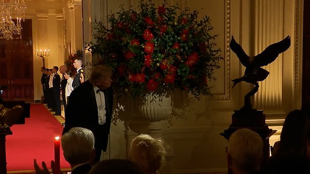 Trump surprises Xi with gifted bald eagle sculpture at state dinner