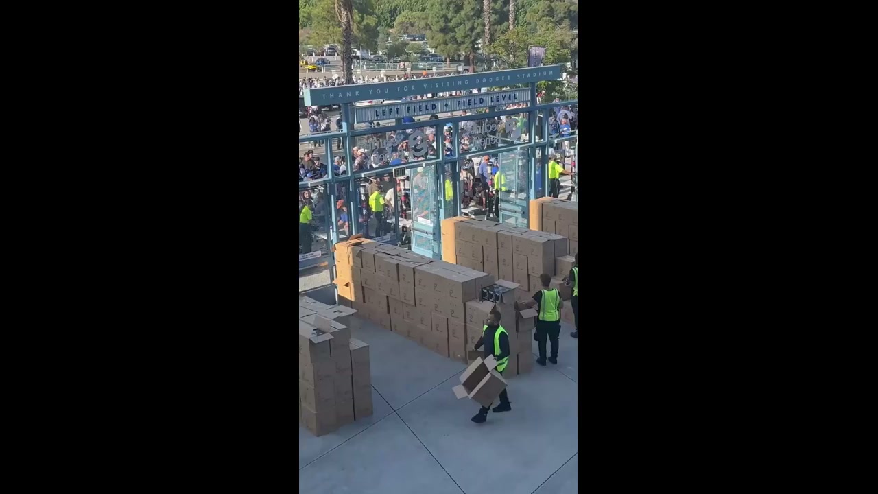 Thousands line up for 'Godzilla' bobble-head