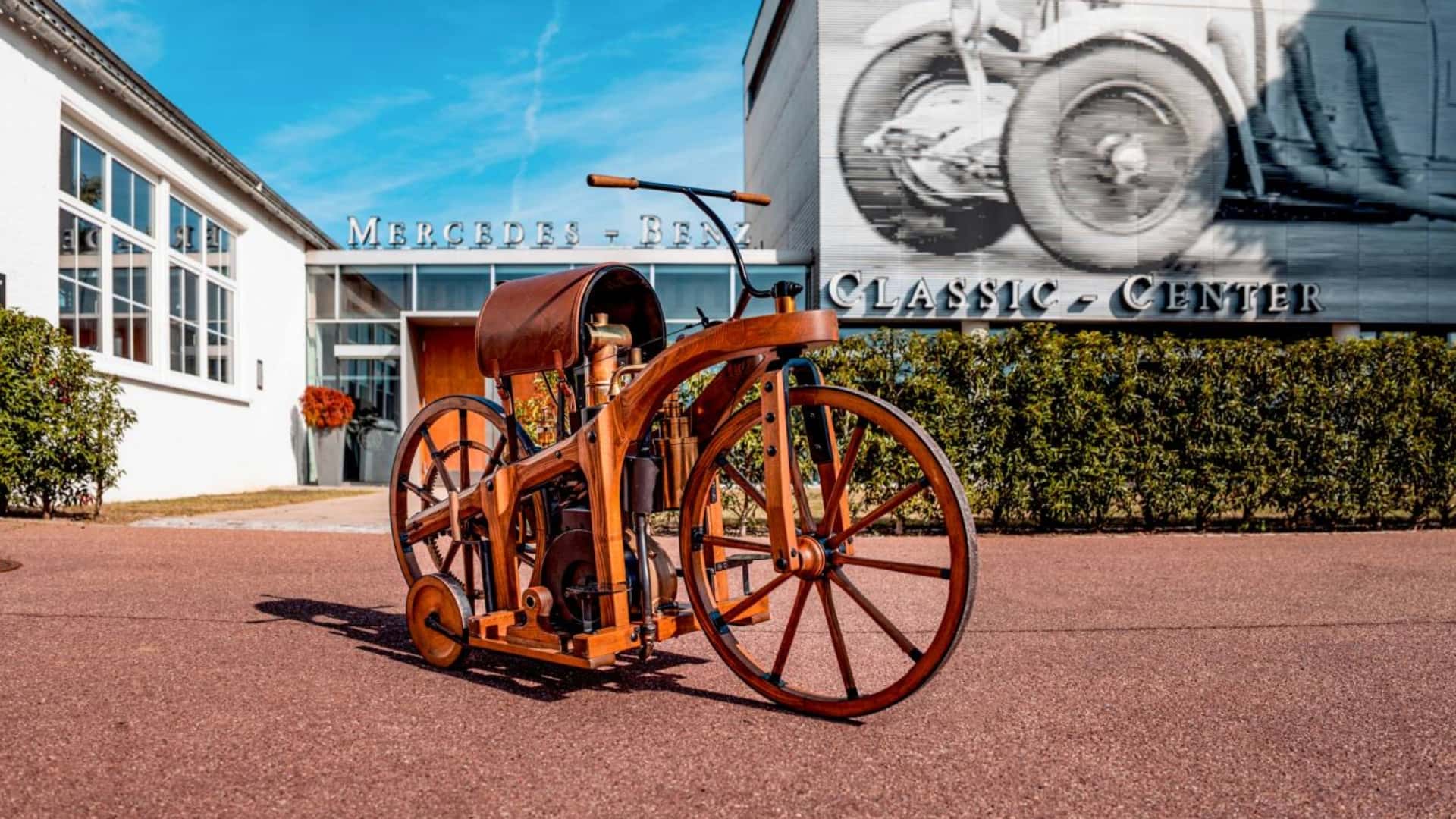 The world’s first gas motorcycle was a wooden test mule with training ...