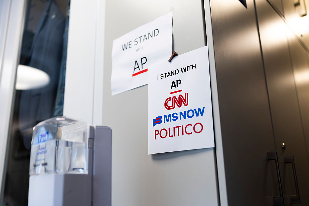 Major news outlets band together to fight Trump ban