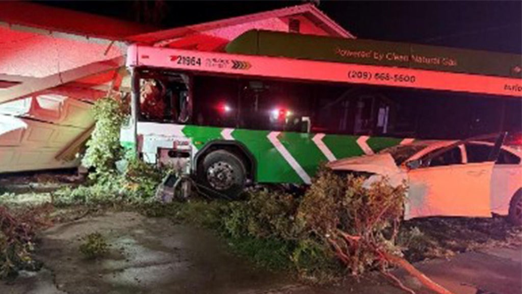 Turlock transit bus crashes into house after collision, leaving 1 dead