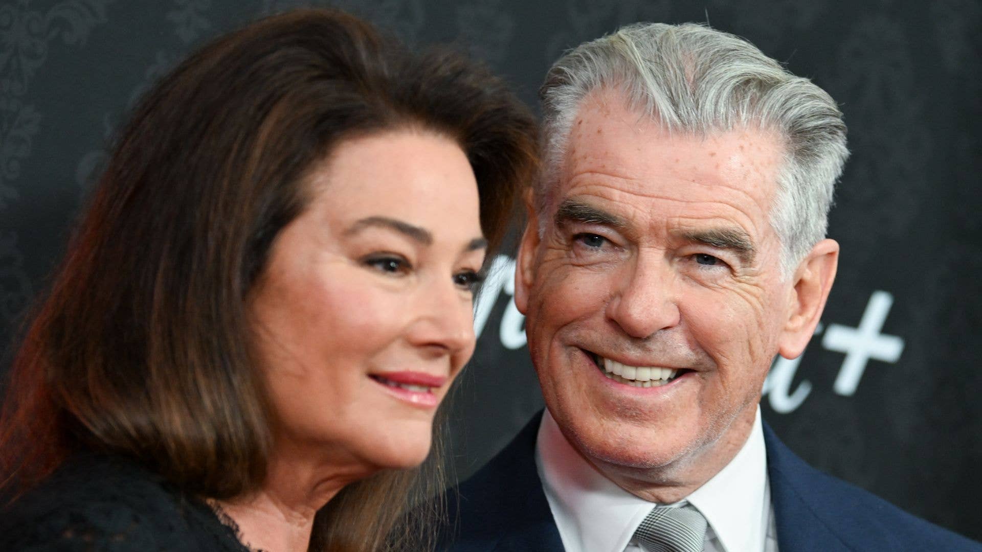 Pierce Brosnan's stunning wife Keely wows in hot red slip dress in family photo with youthful mother and sons