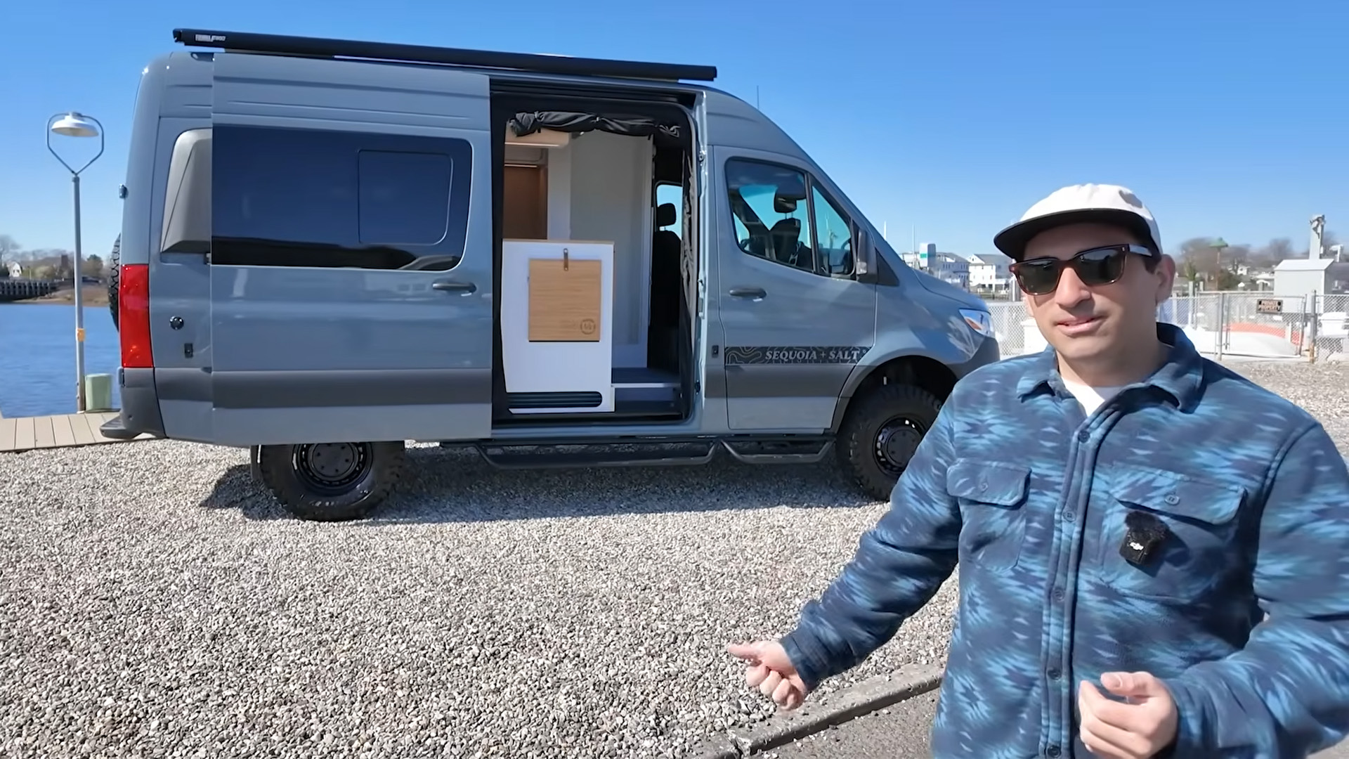 Custom sprinter van tour featuring elevator bed and hidden toilet