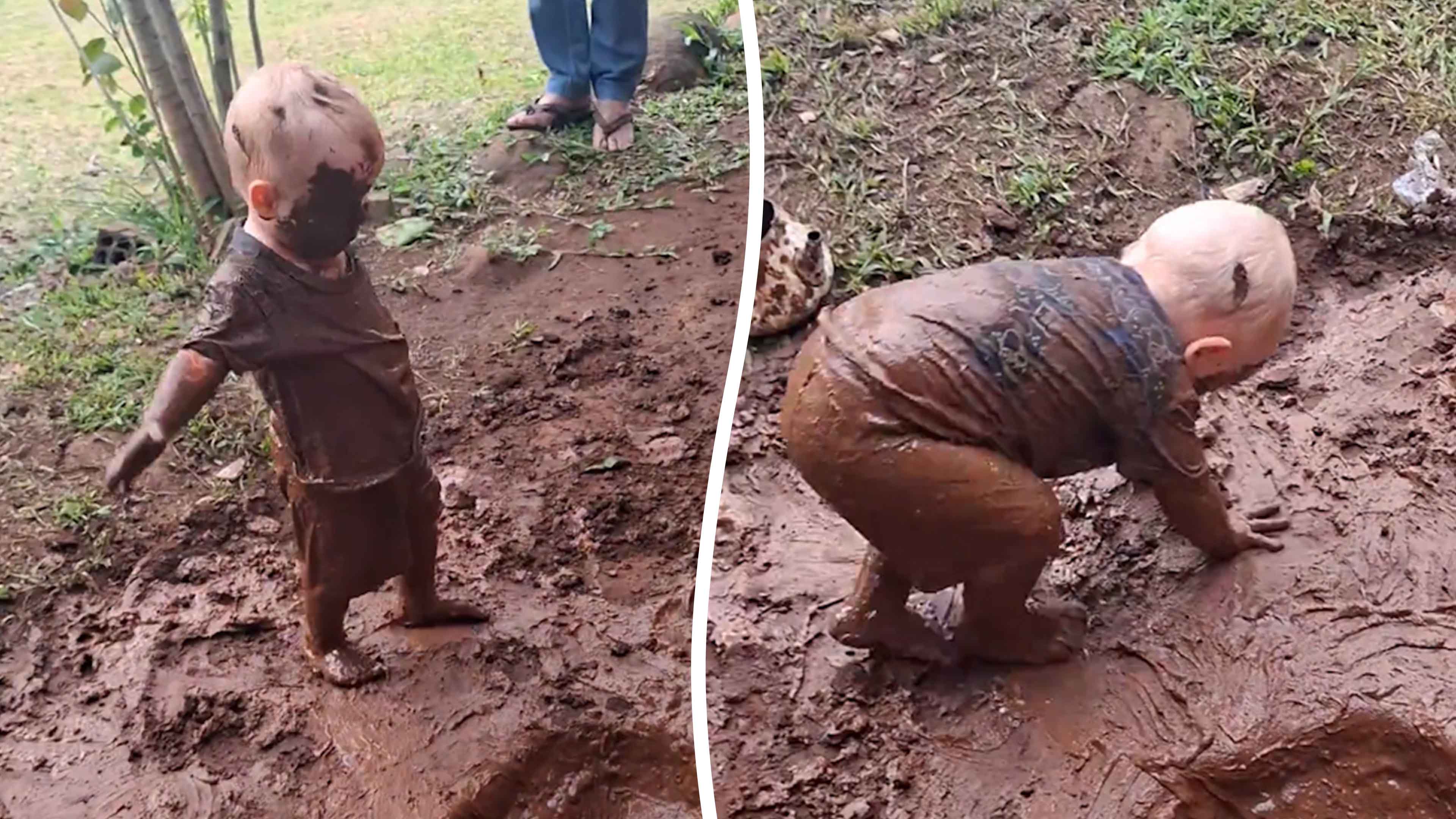 Toddler turns giant mud puddle into playground