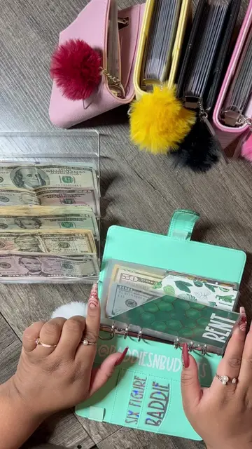 Stuffing my rent and bills cash envelopes with one paycheck