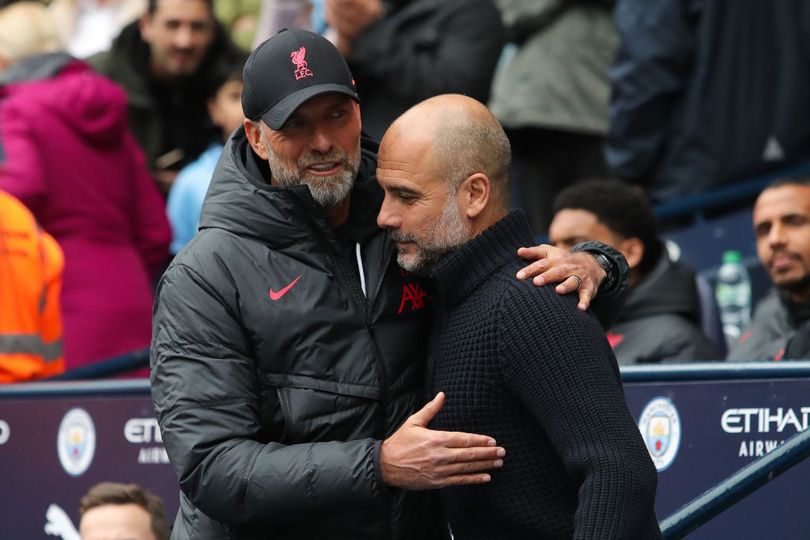 MANCHESTER, ENGLAND - APRIL 01: Jurgen Klopp, manager of Liverpool, embraces Josep 'Pep' Guardiola, manager of Manchester City, ahead of the Premier League match between Manchester City and Liverpool FC at Etihad Stadium on April 01, 2023 in Manchester, England. (Photo by James Gill - Danehouse/Getty Images)