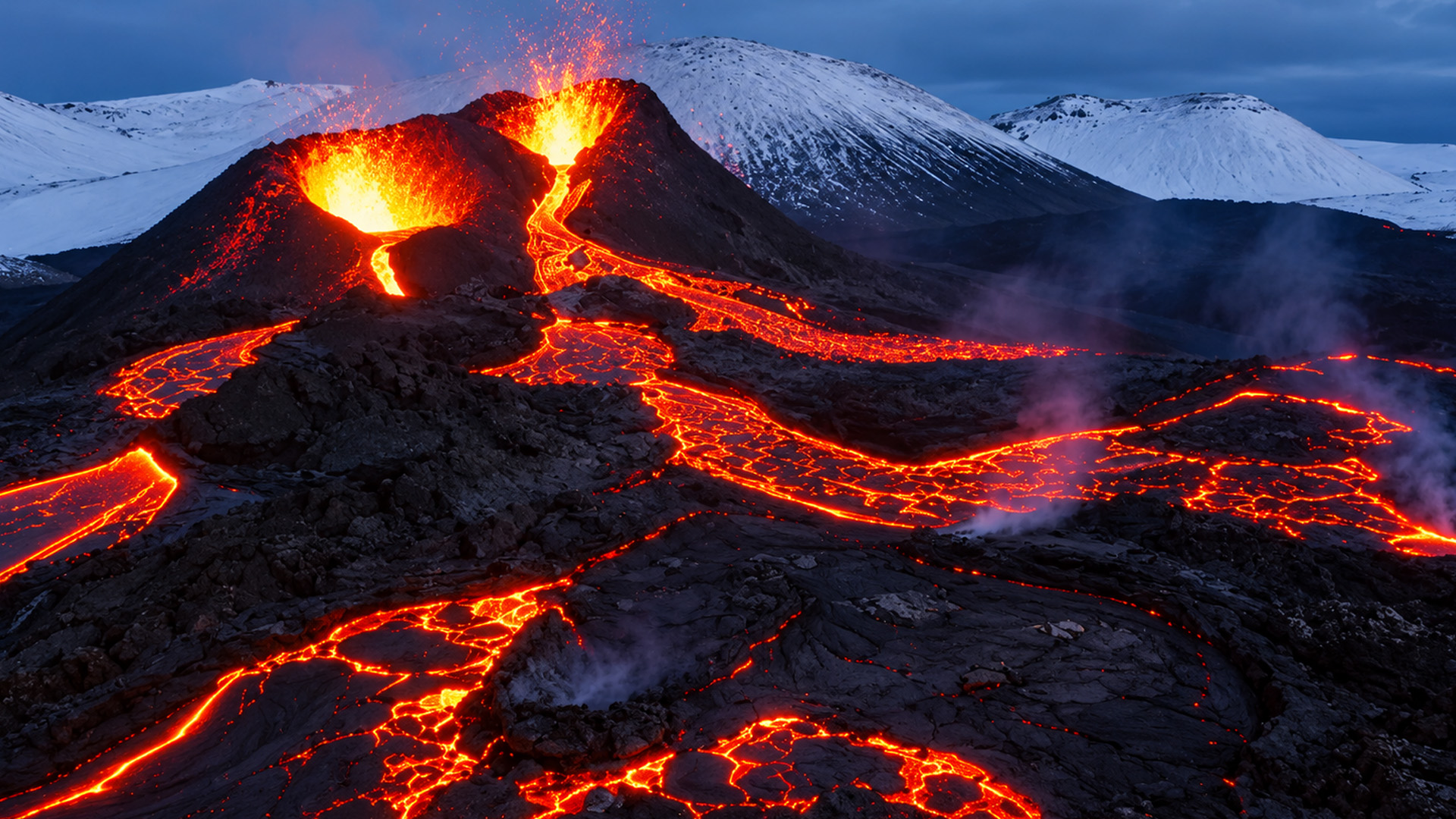 Molten lava cuts across Iceland’s frozen landscape