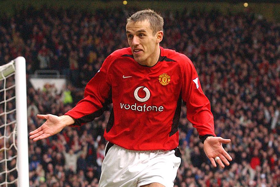 Phil Neville serves as an unglamorous example for Dorgu. | John Peters/Manchester United/Getty Images