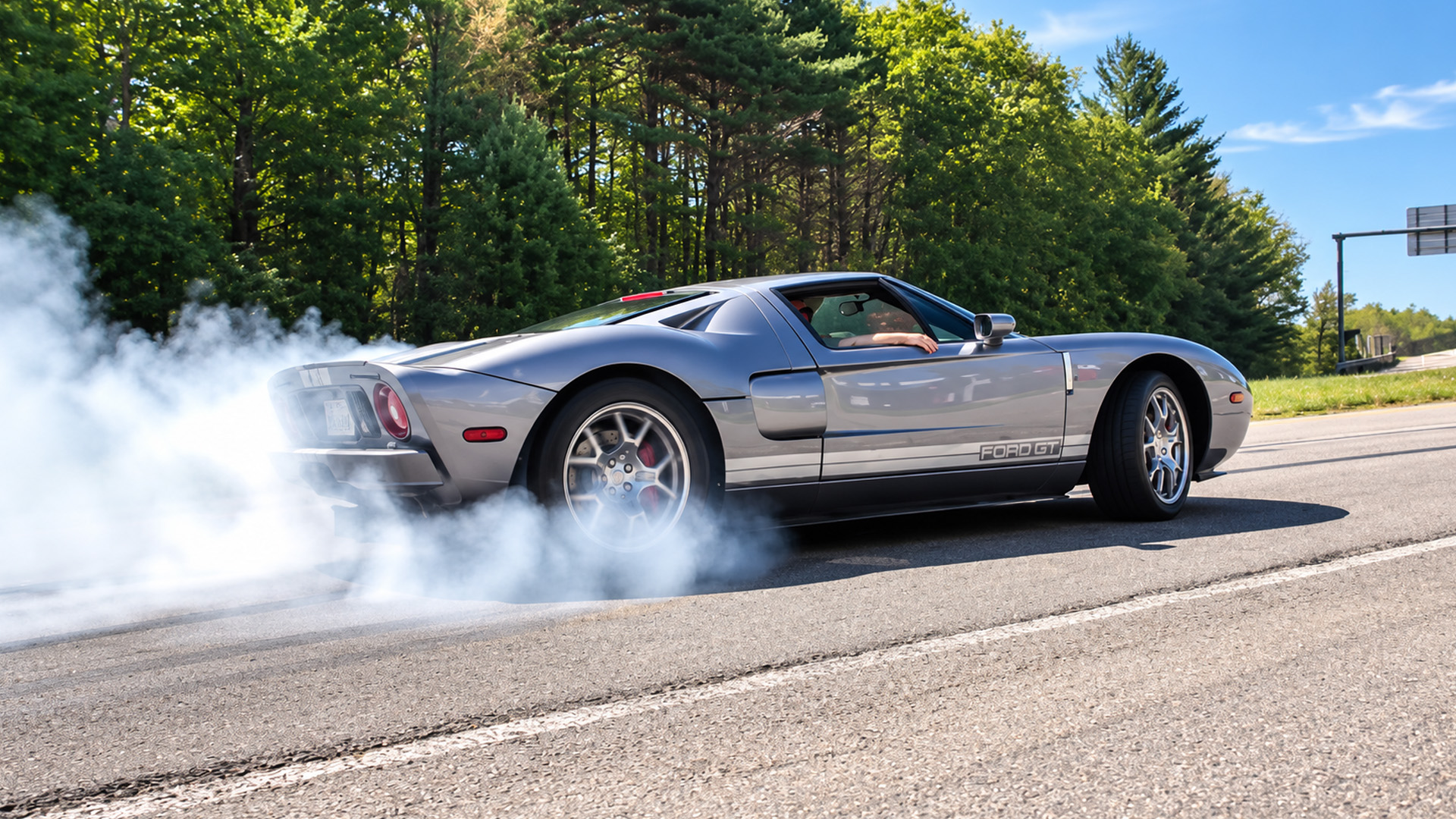 Modified cars leave the show with smoke sound and sideways action