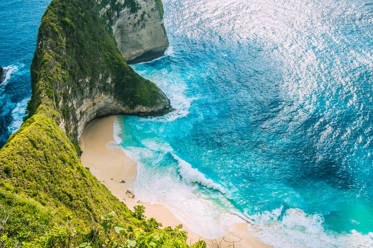 Australian woman dies after falling from cliff on island near Bali