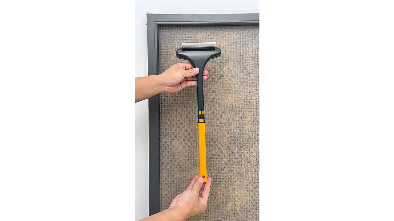 Brushing window screen mesh to remove dust resulting in cleaner and ...