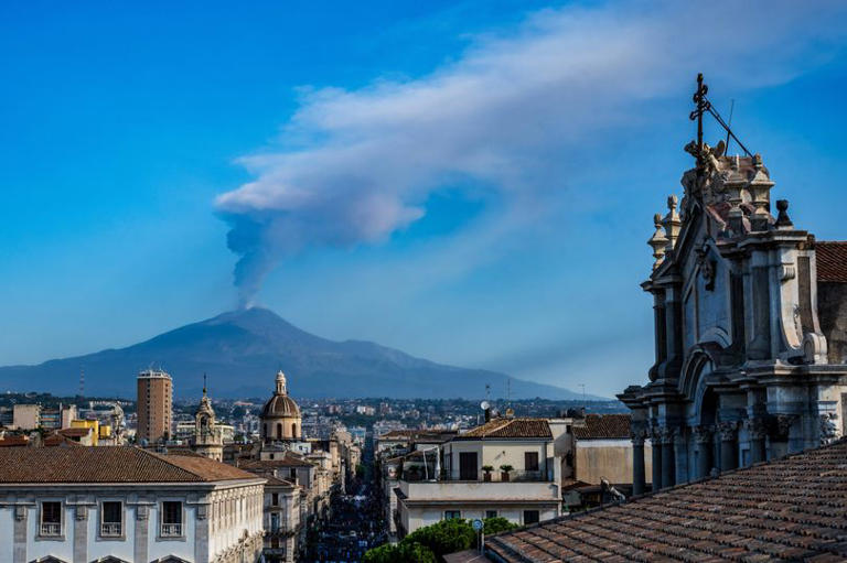 Flights cancelled as volcano erupts at holiday hotspot causing travel chaos