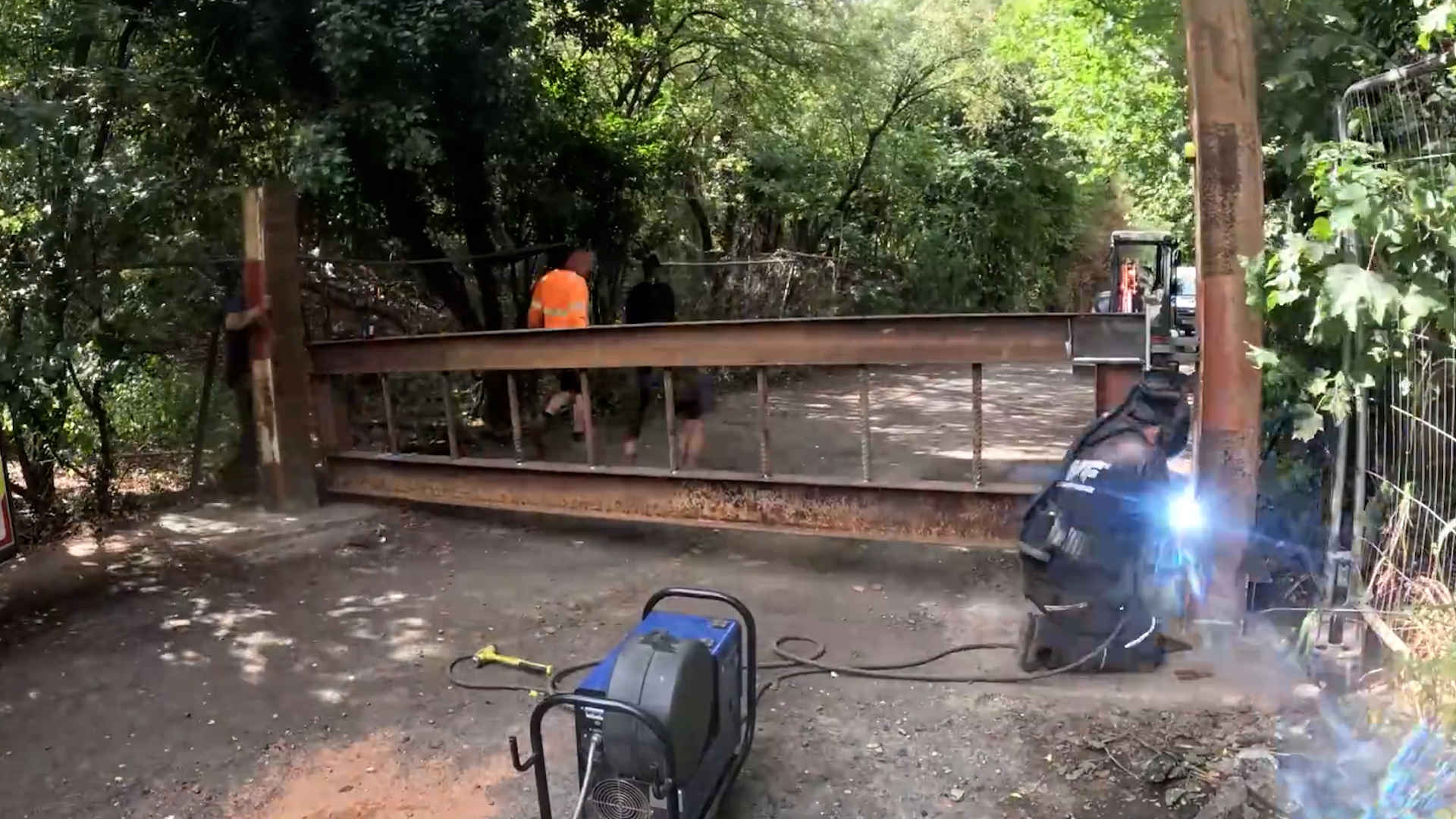 Skilled welder builds a massive steel structure on site