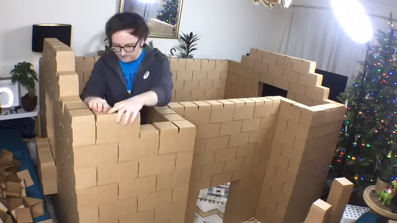 Two cats battle a giant maze