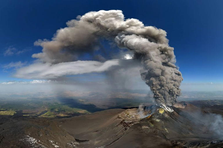 Flights cancelled as volcano erupts at holiday hotspot causing travel chaos