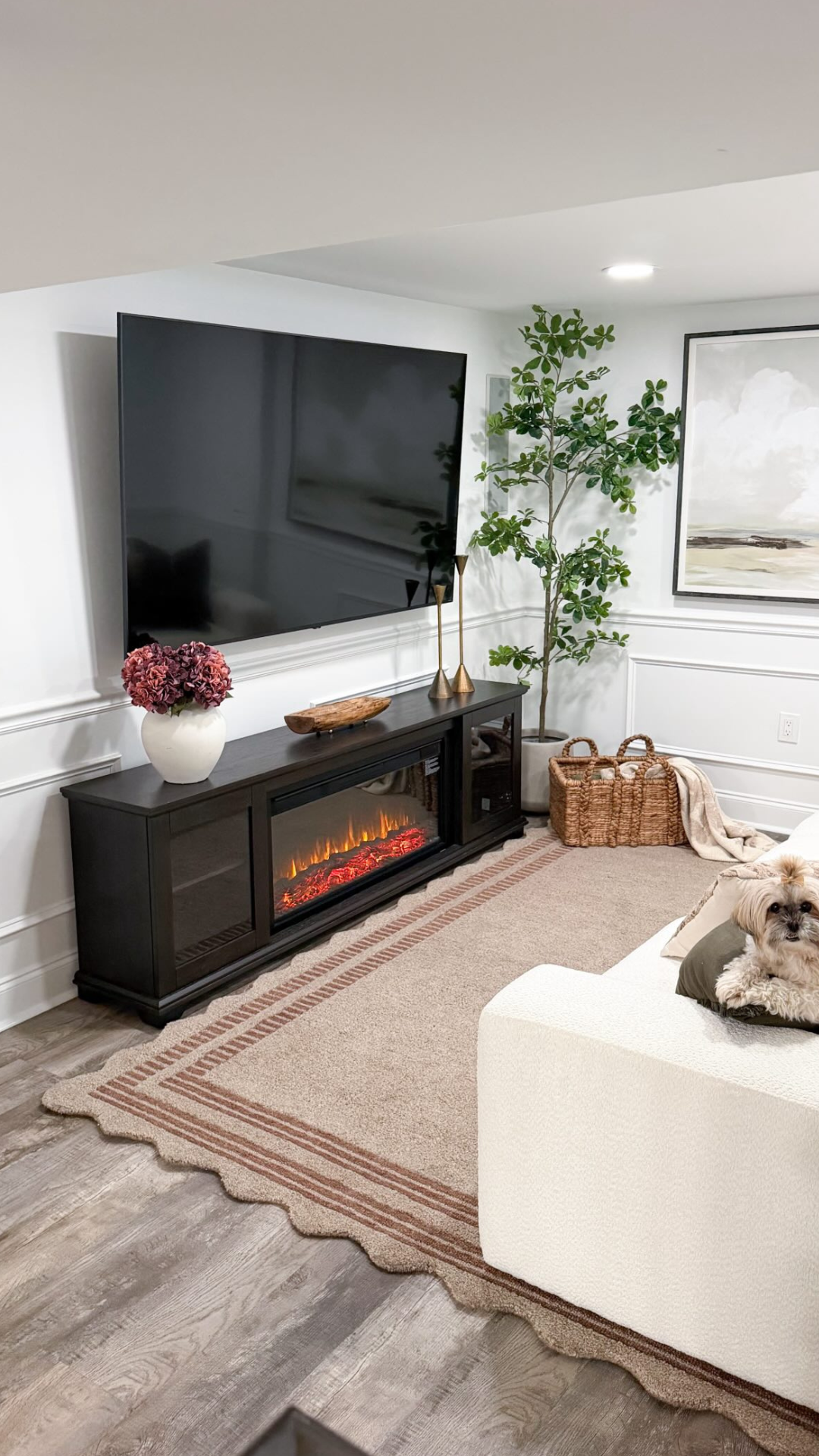 Scalloped rug brings warmth to a media room