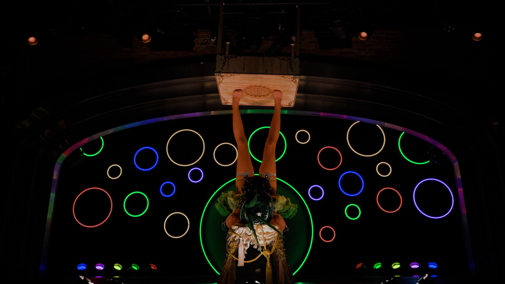 Most foot juggling spins of a table in 30 seconds - 77 by Emma Phillips