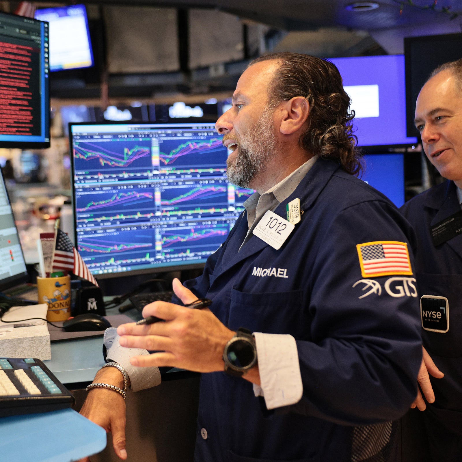 Tech stocks slump after AI execs call for industry slowdown