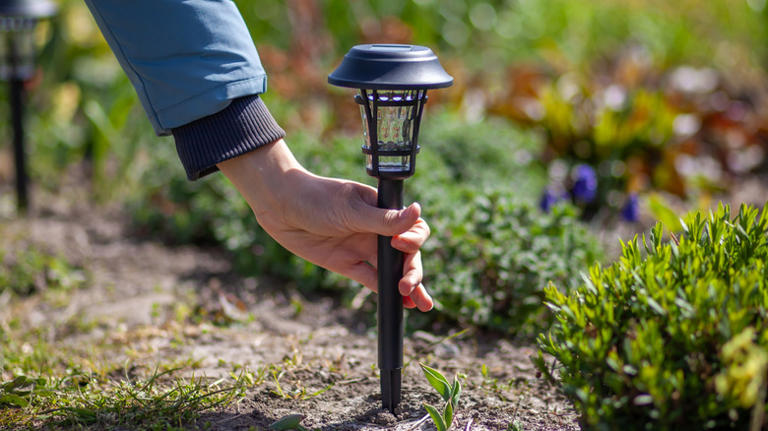Help your solar-powered Dollar Tree garden lights stand taller with an ...