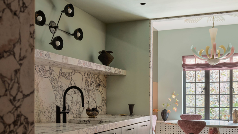 This designer used a chandelier as a wall sconce instead of on the ...