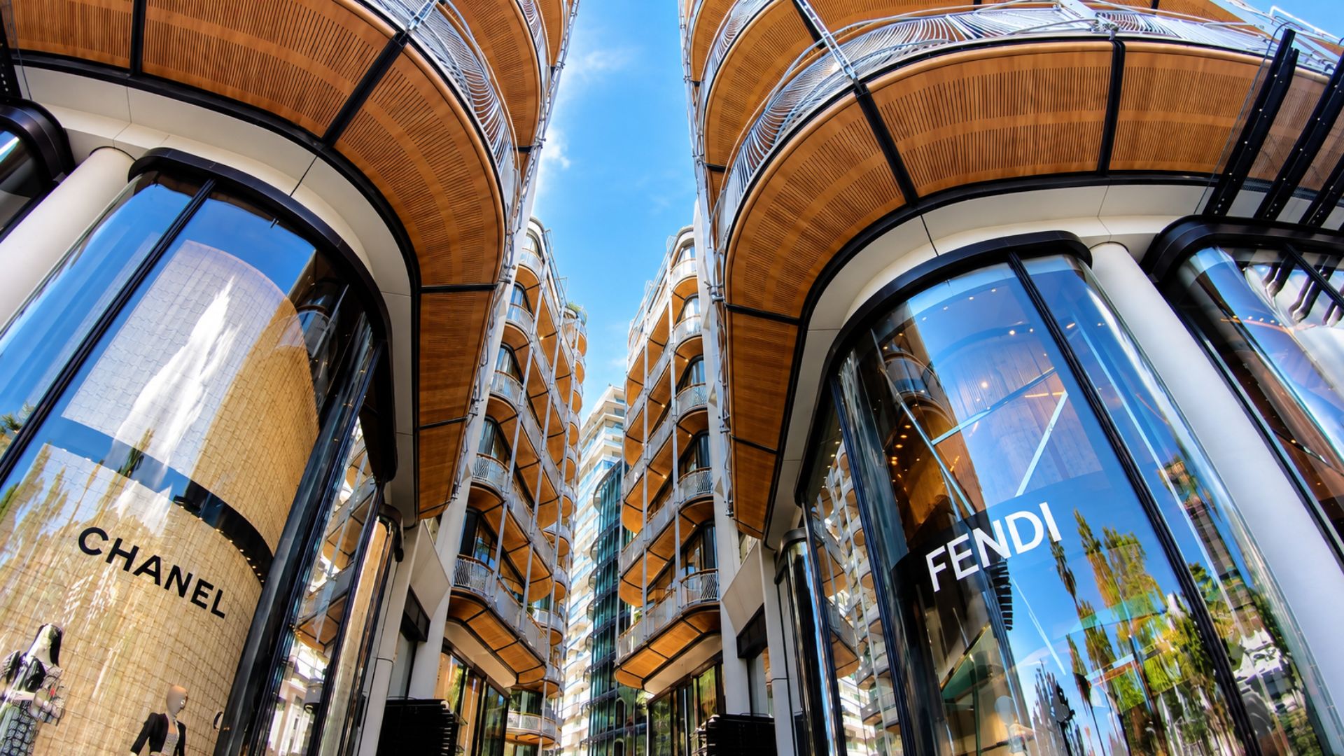 Luxury boutiques line this modern Monaco passage (4K)