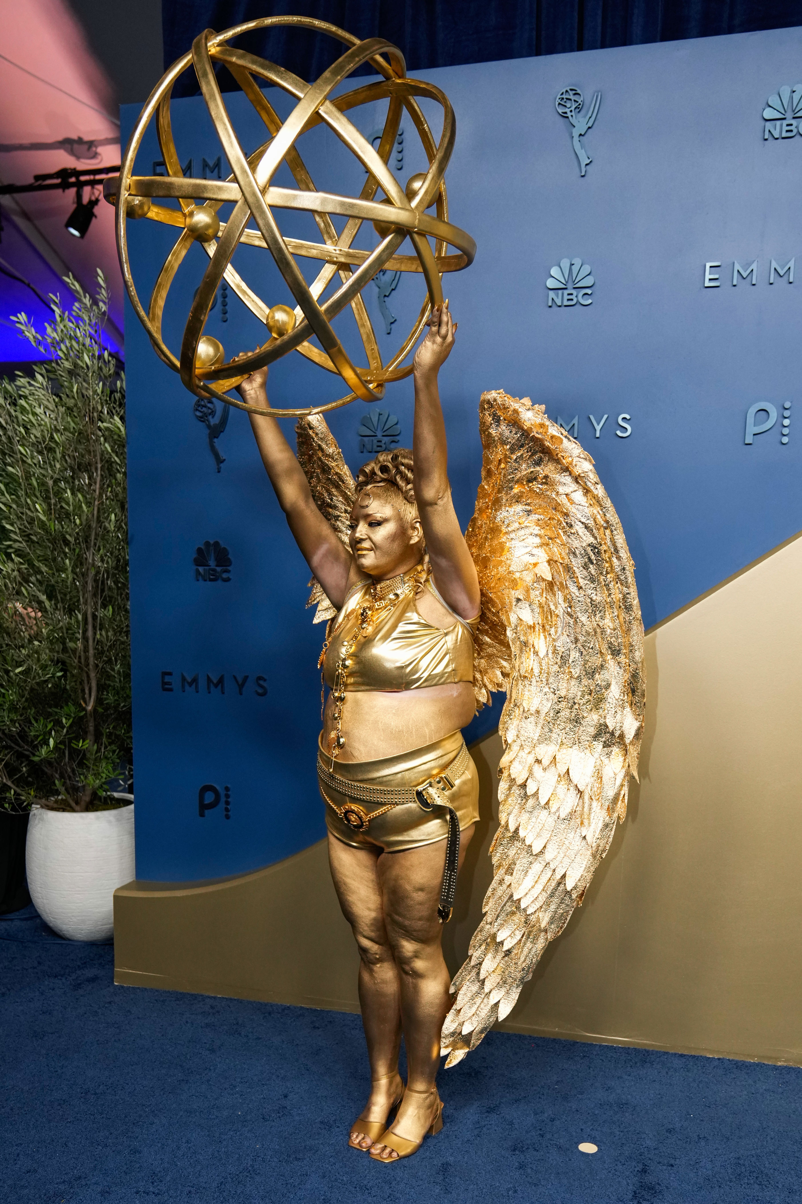 Meg Stalter dressed as an Emmy award (Mark J Terrill/AP) (AP)