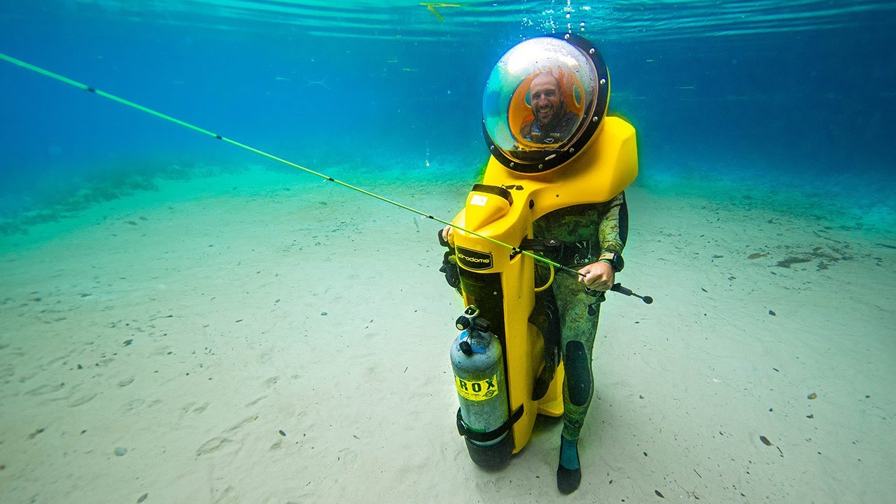 Fishing deep inside a blue hole with a personal submarine
