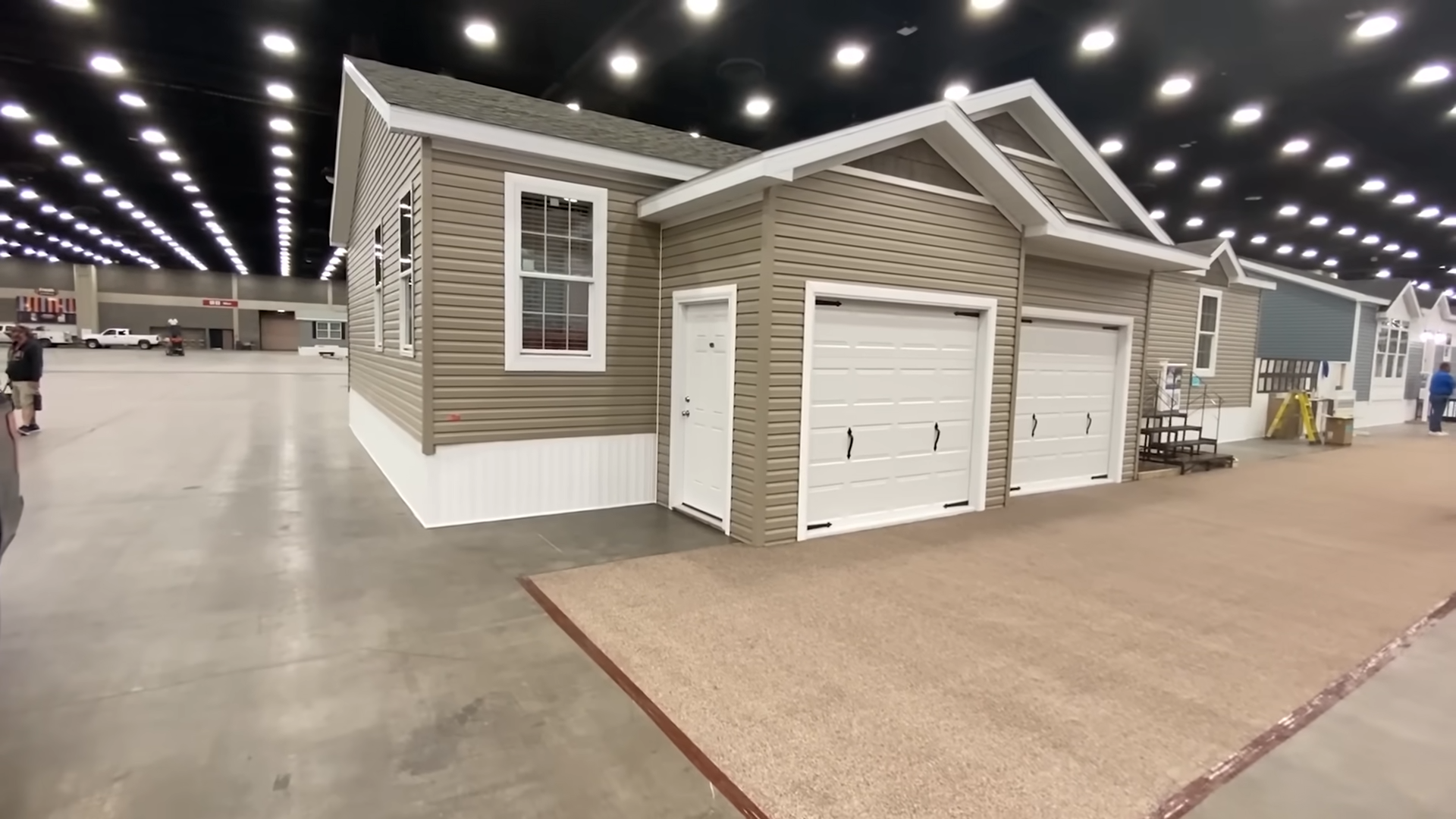 This new double wide has an attached garage!