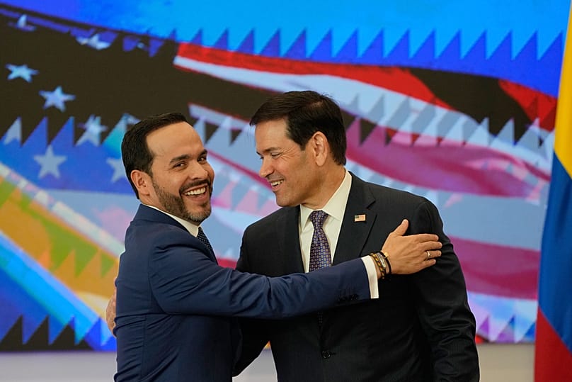 Colombian President Abelardo De La Espriella, left, and U.S. Secretary of State Marco Rubio embrace during a bilateral agreements signing ceremony in Barranquilla, Colombia. Copyright 2026 The Associated Press. All rights reserved