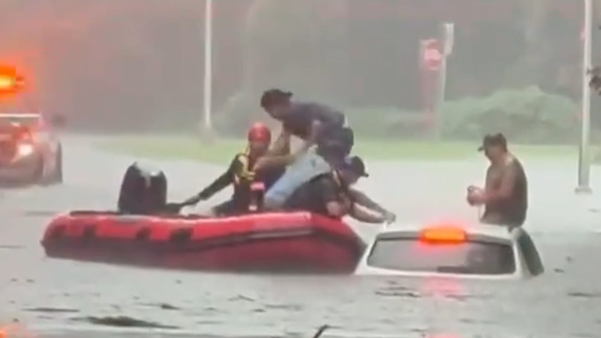 Two rescued from top of vehicle as flooding submerges car in Rye