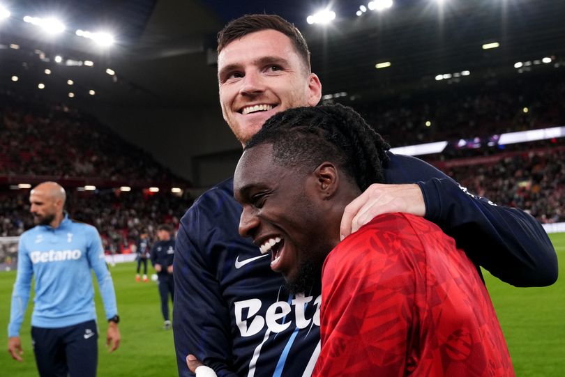 LIVERPOOL, ENGLAND - SEPTEMBER 15: Andy Robertson of Tottenham Hotspurs (L) and Jeremie Frimpong of Liverpool embrace ahead of the Carabao Cup Third Round match between Liverpool and Tottenham Hotspur at Anfield on September 15, 2026 in Liverpool, England. (Photo by Liverpool FC/Liverpool FC via Getty Images)